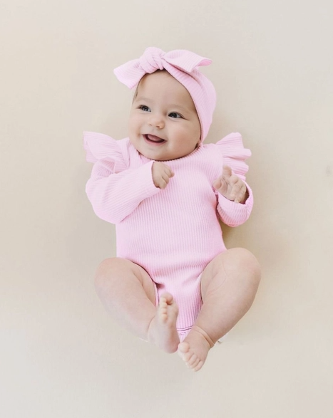 ribbed flutter sleeve baby bodysuit|pink